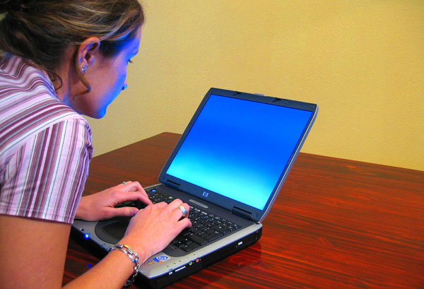 https://commons.wikimedia.org/wiki/File:Woman-typing-on-laptop.jpg